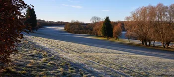 Frozen golf course with golfers.jpg